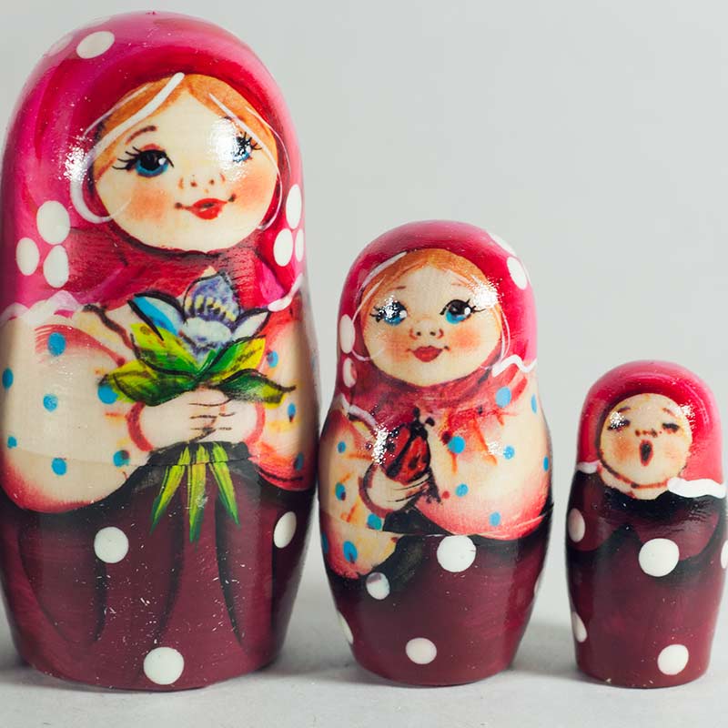 Matryoshka Girl Masha with Flowers in Nesting Dolls Traditional Dolls category